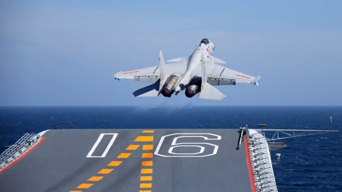 A J-15 carrier-borne fighter jet takes off from the flight deck of the aircraft carrier Liaoning during a maritime training exercise on July 1, 2017. The Chinese aircraft carrier Liaoning and its carrier strike group carried out realistic training in an undisclosed sea area on July 1, 2017. (eng.chinamil.com.cn/Photo by Li Tang)