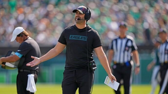 Eagles coach apologizes for yelling and gesturing angrily at fans in the stands