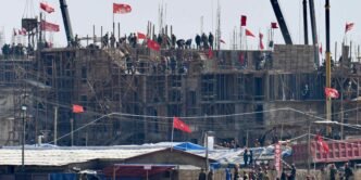 North Korea border town sees construction boom after floods