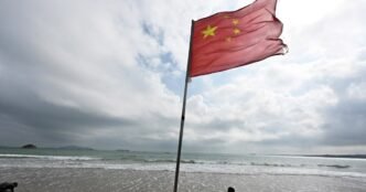 Taiwan says Chinese military sent a record 153 planes toward island during war games