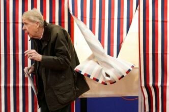 US voters cast ballots in tight race as campaign nears climax