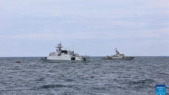 Chinese and Vietnamese navies conduct a search and rescue drill during the 36th joint patrol of Chinese and Vietnamese navies in Beibu Gulf in the South China Sea, June 26, 2024. (Photo by Li Zhengsong/Xinhua)