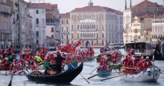 Santas take over Venice's Grand Canal in annual Christmas regatta