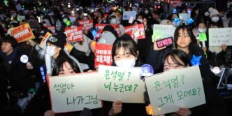 South Korea martial law brings youth into streets with K-pop light sticks