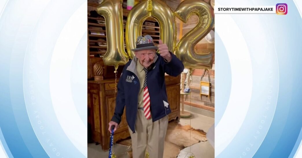 102-year-old 'Papa Jake' throws first pitch at spring training game