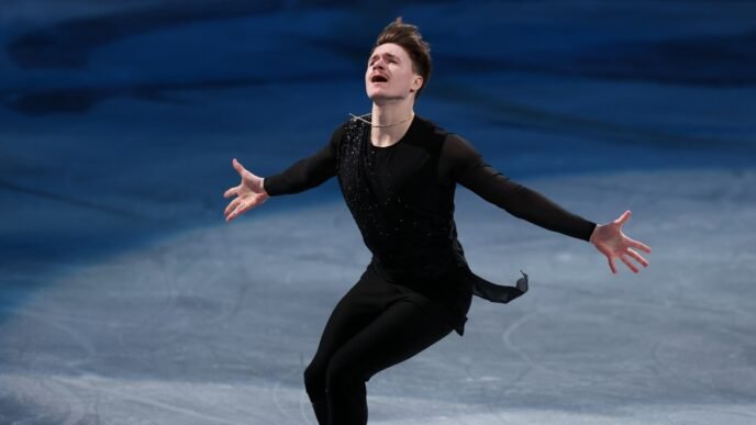Figure skater whose parents died in D.C. plane crash brings world championships crowd to its feet