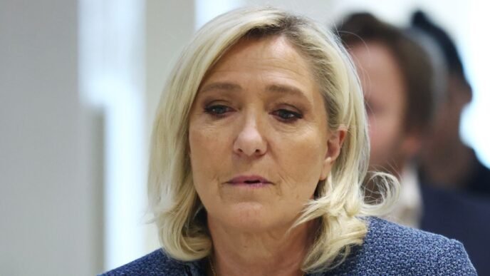 France's Le Pen found guilty in ruling that could end her career