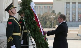 Deputy Chairman of the Russian Security Council Dmitry Medvedev attends a wreath-laying ceremony at the Monument to the People