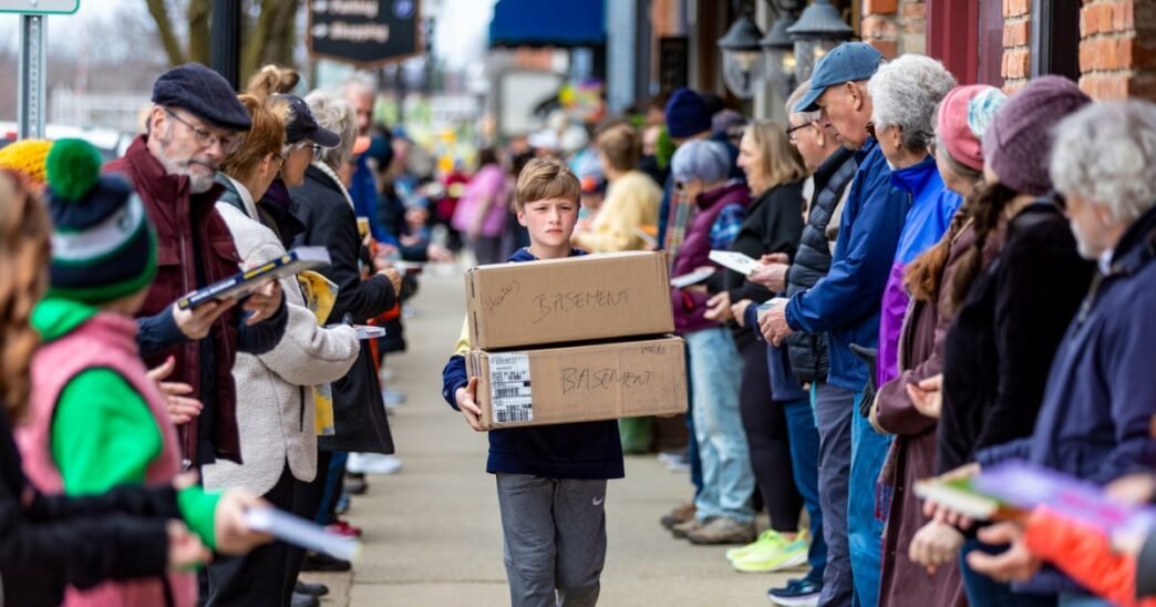 A Michigan community takes a novel approach to moving 9,100 books for shop's next chapter