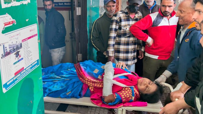 At least 26 tourists killed by gun men at a resort in Kashmir, Indian police say