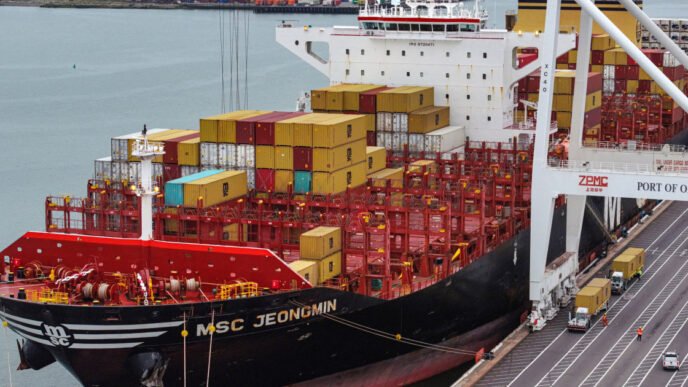 Businesses are already trying to pass tariff costs onto customers, Fed report says