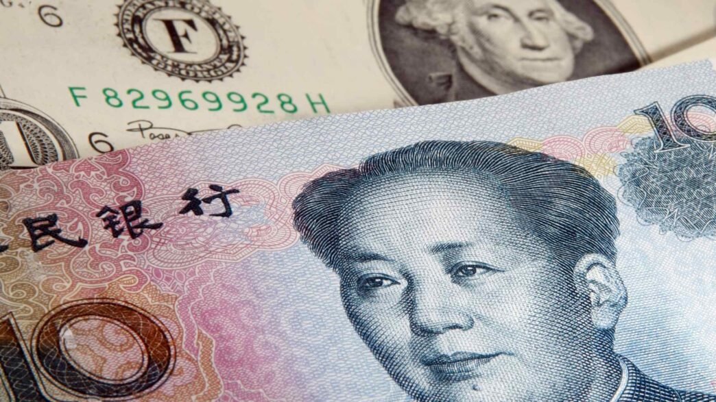 China's yuan hits 19-month low after central bank guides currency weaker