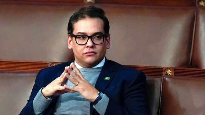 Former Rep. George Santos sentenced to more than 7 years in prison
