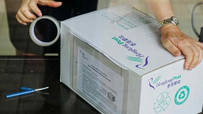 Hong Kong stops U.S.-bound parcels, strikes defiant tone on tariffs
