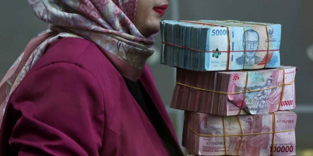 Indonesia maintains key interest rate at 5.75% as rupiah slumps