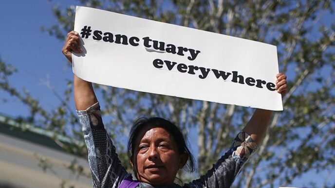 Judge blocks Trump bid to halt federal funding for sanctuary cities