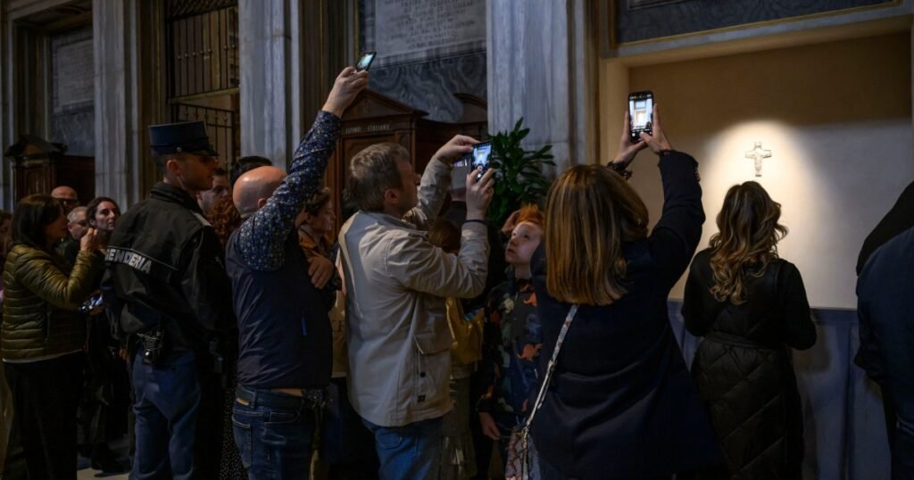 Long lines as Pope Francis’ humble final resting place opens to the public
