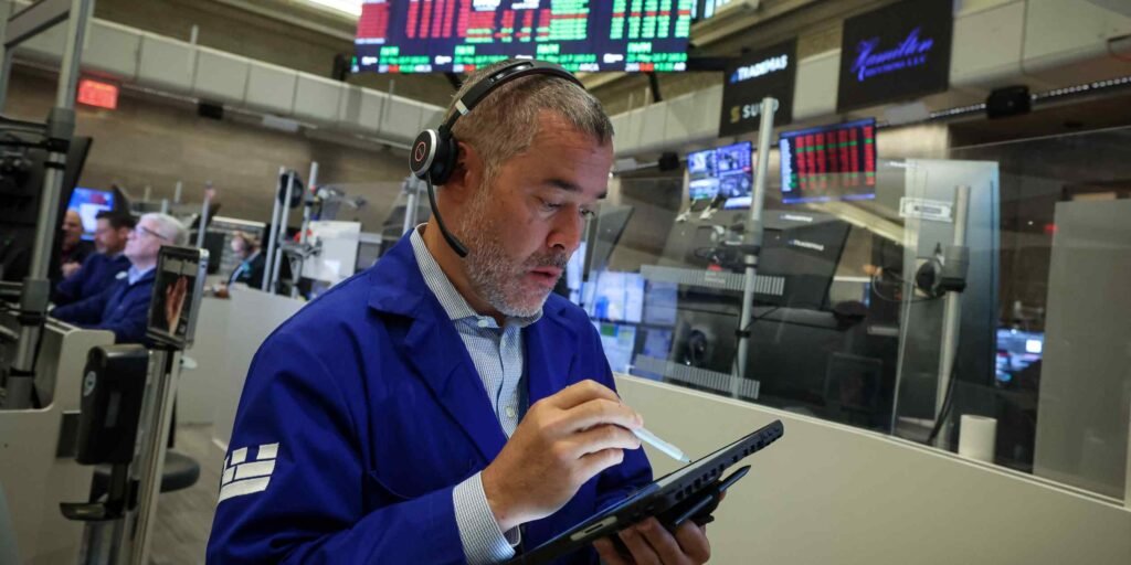 Wall St. slumps as Trump renews tirade against Fed's Powell