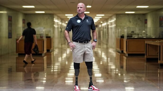A double amputee who served in Iraq is pushing lawmakers to end the 'wounded veterans tax'