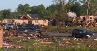 Buildings damaged and trees scattered across St. Louis and Kentucky