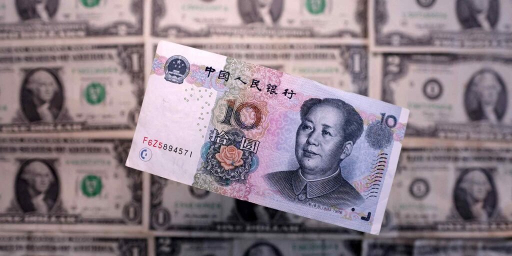 Chinese firms in US to hold back investments over inflation, survey shows