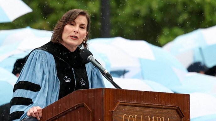 Columbia University’s acting president booed again noting absence of activist Mahmoud Khalil in commencement speech