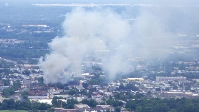 Fire burns out of control at vacant mattress warehouse in Baltimore