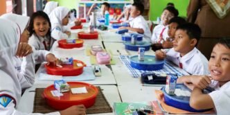 Indonesia's free meals marred by missed payments and poisoning