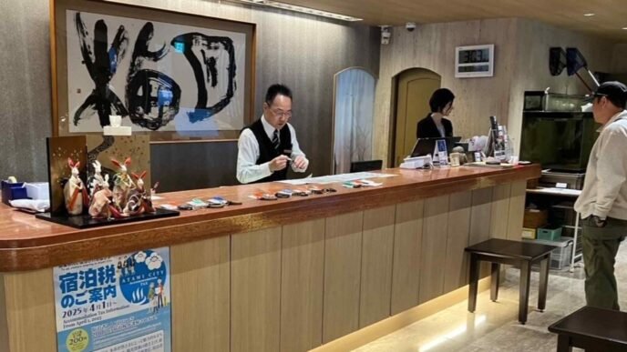 Inundated with tourists, Japanese towns look to taxes on visitors