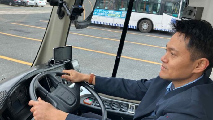 Japan considers lower language hurdles for foreign bus, cab drivers
