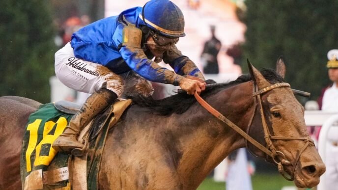Kentucky Derby-winning jockey suspended, fined $62,000 for striking horse too many times