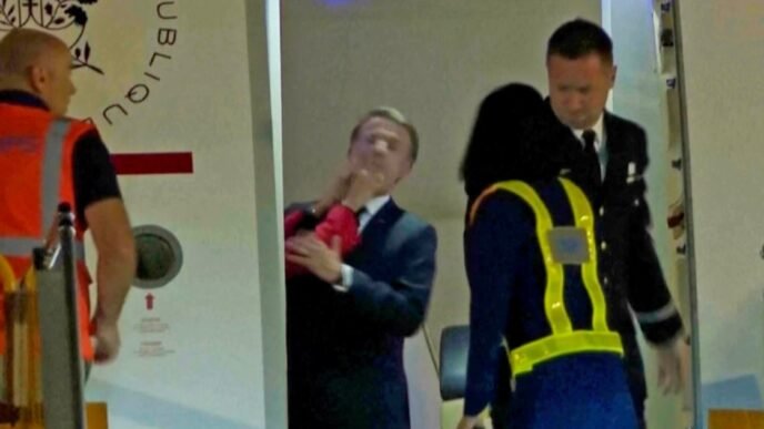 Macron's office downplays video appearing to show his wife pushing him in the face