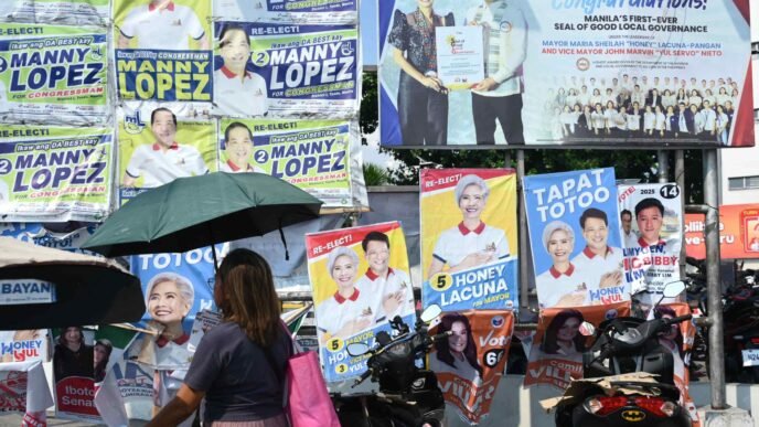 Philippines elections live: Nation split between Marcos and Duterte