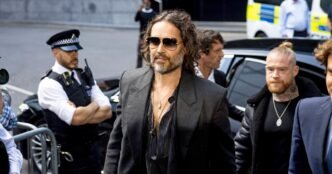 Russell Brand arrives at London court to face rape and sexual assault charges
