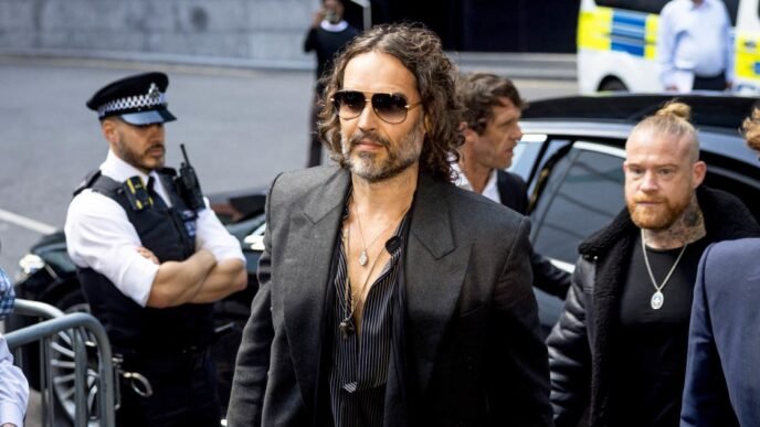 Russell Brand arrives at London court to face rape and sexual assault charges