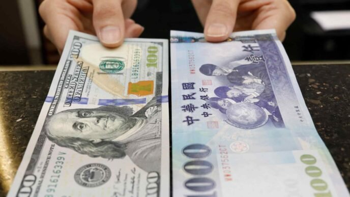 Taiwan dollar rises at fastest pace in decades, threatening tech profits