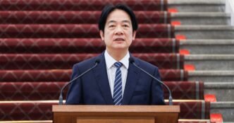 Taiwan president offers peace with China but says island must strengthen defenses