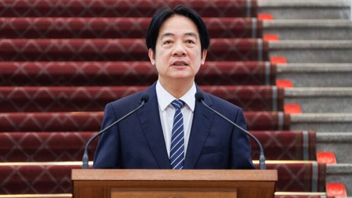 Taiwan president offers peace with China but says island must strengthen defenses