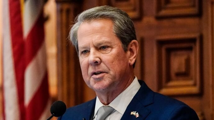 Georgia Gov. Brian Kemp passes on running for a key Democratic-held Senate seat