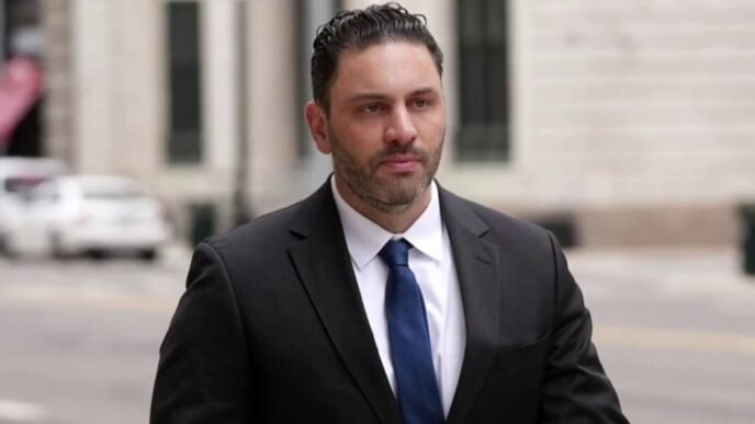 DOJ says former football coach hacked private photos of thousands of female athletes
