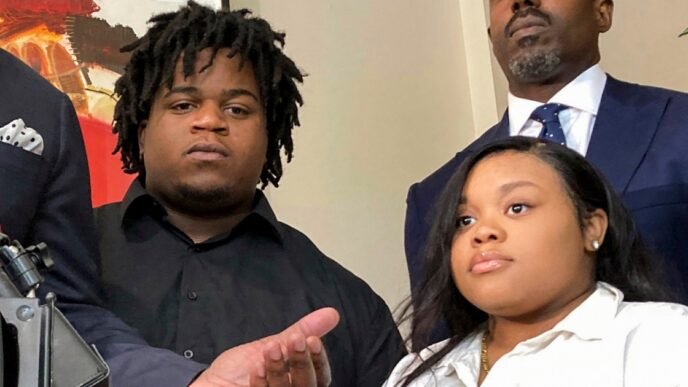 Attorney Roderick Edmond, left, speaks alongside Treveon Isaiah Taylor, Sr., center, Jessica Ross and attorney Cory Lynch, in Atlanta on Aug. 9, 2023.