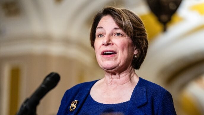 Klobuchar says authorities believe the suspect in 'politically motivated' killing of Minnesota lawmaker is in the Midwest