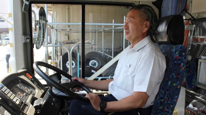 Labor-starved Japan taps foreigners and seniors to drive its buses