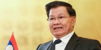 Laos president says must lure more countries to invest