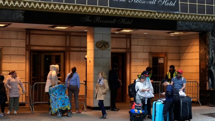 New York City closes arrival center for migrants in once grand Manhattan hotel