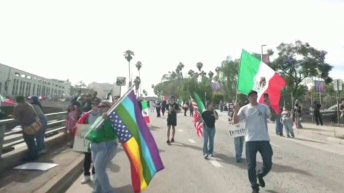 Police move to clear streets as 20,000 protest in Los Angeles